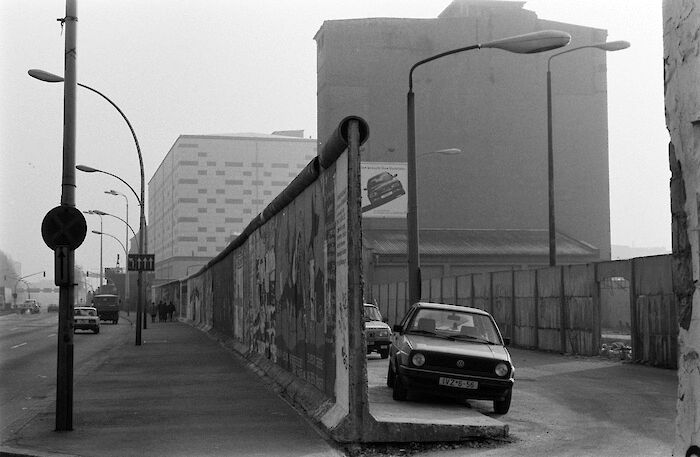 A fence divided the road for the mill workers and the GDR border guards, the granary is visible in the background, January 1992