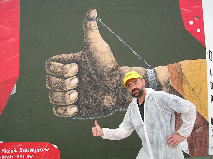 Mikhail Serebryakov in front of his finished painting, 2009