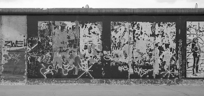 Defaced Wall sections bearing the photos by Andreas Kämper and Jens Hübner, untitled, 1997